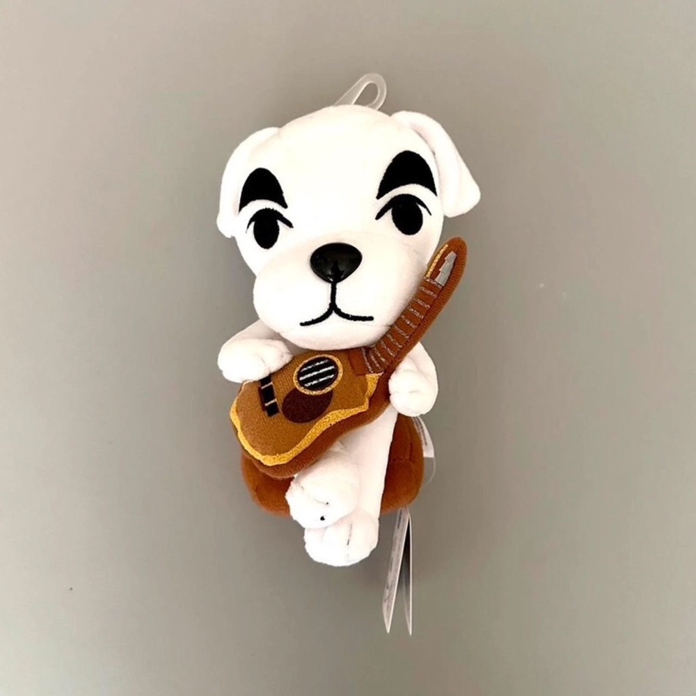 Big-eyed guitar dog toy doll